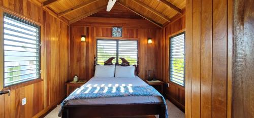 Ένα ή περισσότερα κρεβάτια σε δωμάτιο στο Therapy Cabins