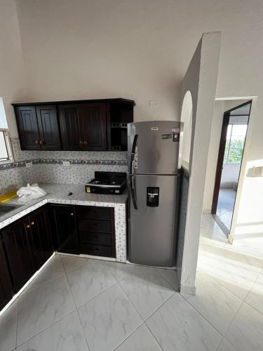 A kitchen or kitchenette at Acogedor y elegante apartamento en Apartadó