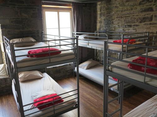 Cama ou camas em um quarto em Alt Hostel