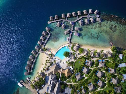 an aerial view of an island in the ocean at Manava Beach Resort & Spa Moorea in Maharepa