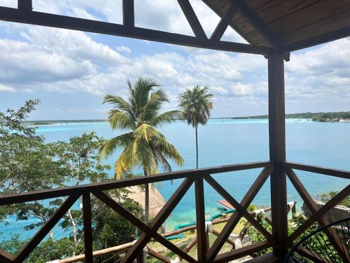 a view of the ocean from a resort window at bacalar My Love Front Laguna in Bacalar