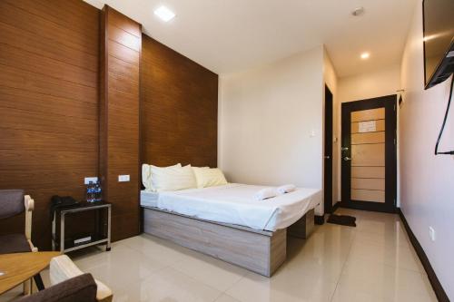 Ліжко або ліжка в номері Vigan Traversa Hotel
