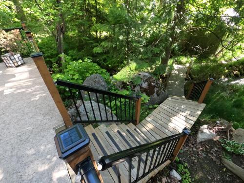 an overhead view of a bench in a garden at 4 Mile Creek Cabin (Creekside) in Nelson