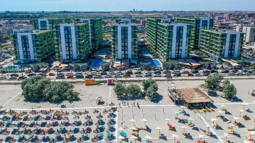 an aerial view of a city with tall buildings at Beach Resort Studio Fitness-spa-pool in Mamaia Nord