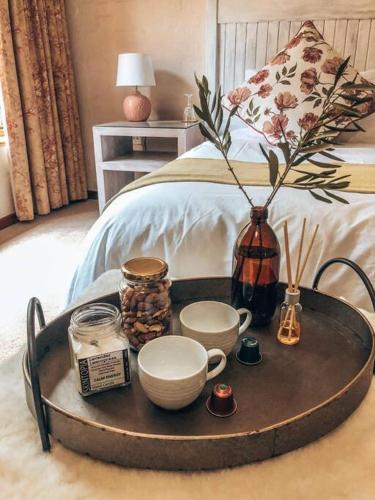 Una cama o camas en una habitación de Eden Rain