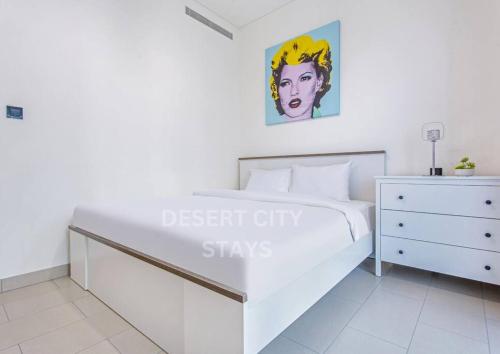 Postel nebo postele na pokoji v ubytování Beautiful 1 BR in Sobha Creek Vistas Reserve, Hosted by Desert City Stays