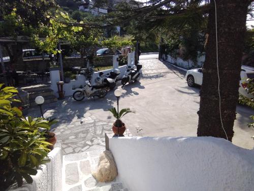 a group of scooters parked in a parking lot at Villa Ourania in Troulos