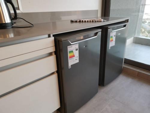 Η κουζίνα ή μικρή κουζίνα στο Exquisito Departamento Reñaca en el sector más turístico