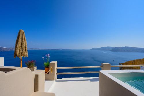 a view of the ocean from a villa at Nano Oia Canaves in Oia