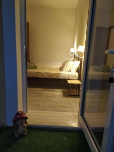 Ένα ή περισσότερα κρεβάτια σε δωμάτιο στο Nala's House