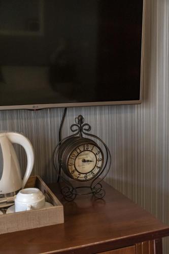 TV a/nebo společenská místnost v ubytování Mali Hotel Porat
