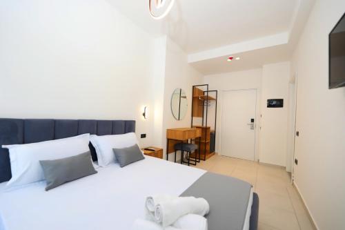 Postel nebo postele na pokoji v ubytování Maor Hotel