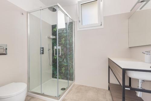 a bathroom with a shower and a sink at Villa Amoenitas by Perle di Puglia in Ugento