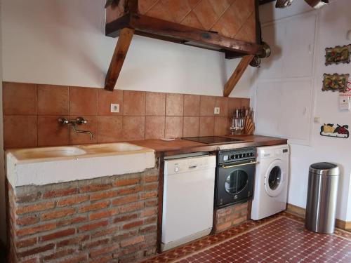 Η κουζίνα ή μικρή κουζίνα στο LA CASONA DE DON ELÍAS