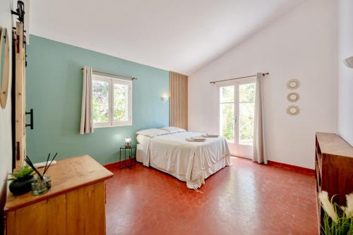 Ένα ή περισσότερα κρεβάτια σε δωμάτιο στο Casa Hestia - Avec piscine privée