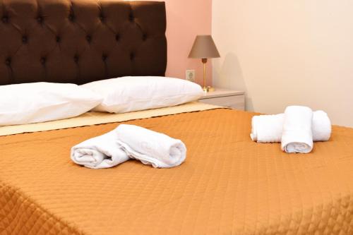 Llit o llits en una habitació de GM Apartment Kefalonia