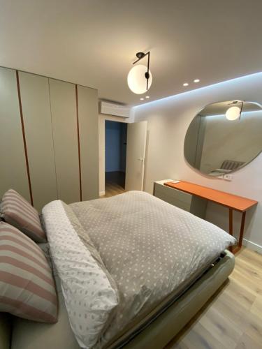 Katil atau katil-katil dalam bilik di Tirana Primo Apartment