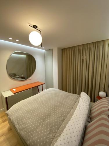 Katil atau katil-katil dalam bilik di Tirana Primo Apartment