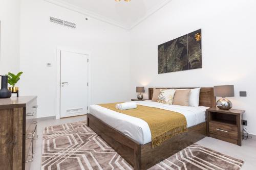 Postel nebo postele na pokoji v ubytování Hot OFFER! Spacious 1BR Palm Jumeirah with Riva Beach Access