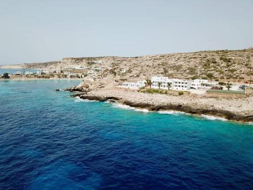 an aerial view of a small island in the ocean at Hotel Krinos in Karpathos Town