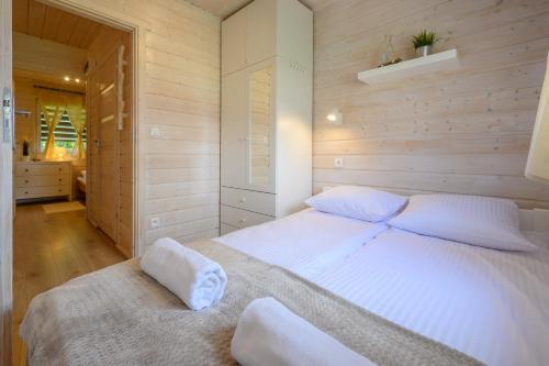 Postel nebo postele na pokoji v ubytování Boho Baltic Resort