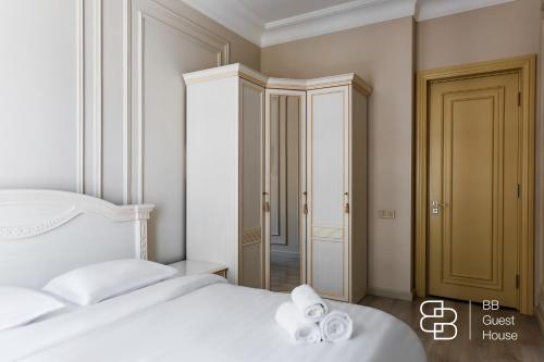 Ένα ή περισσότερα κρεβάτια σε δωμάτιο στο Boulevard Residence