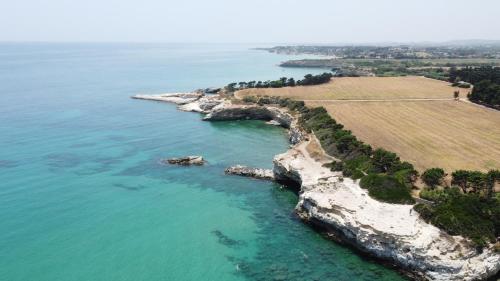 an aerial view of a river with rocks in the water at Villa Rita Pool & Spa in Mascalucia
