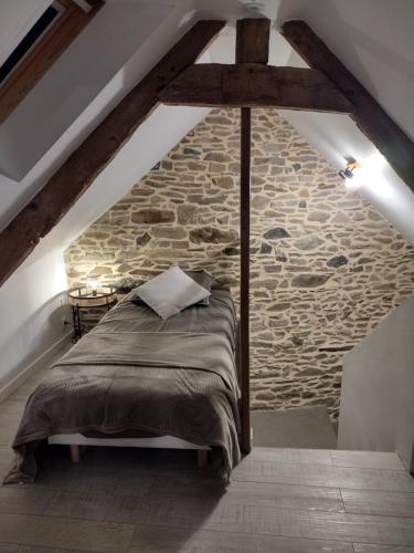Postel nebo postele na pokoji v ubytování Gîte charmant typique Breton Ti Quartier
