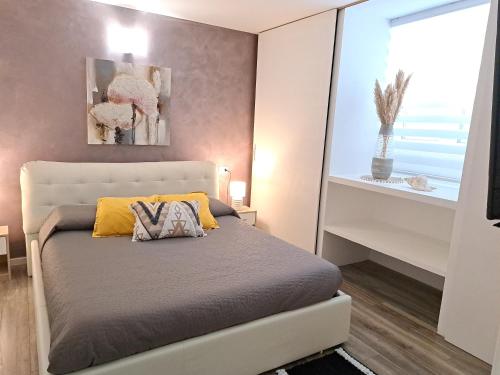 Giường trong phòng chung tại Casa Adriatik & Marina
