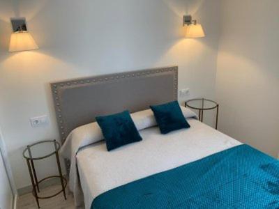 Giường trong phòng chung tại Apartamento Los Nardos