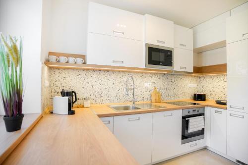 Piroska Bartóktéri Apartman 02 3300 Eger, Bartók Béla tér 12. földszint 2 kép - 3