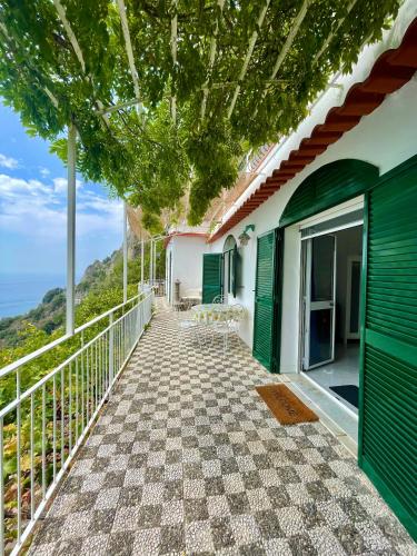 a balcony of a house with a view of the ocean at Villa Carmela in Conca dei Marini