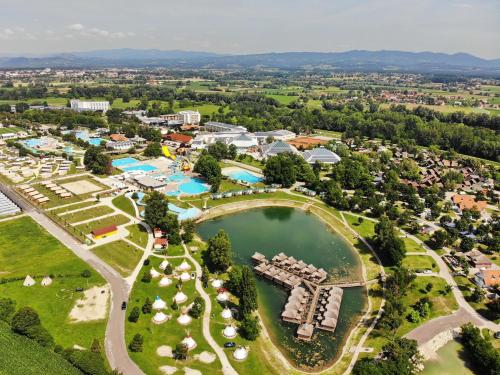 an aerial view of a resort with a pool at Hiška Orel Terme Čatež in Čatež ob Savi