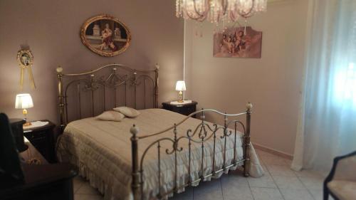 En eller flere senger på et rom på La casa di Anna