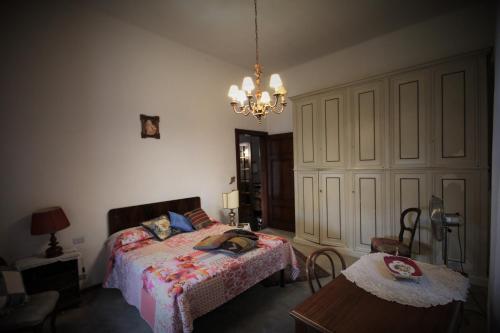 En eller flere senger på et rom på Primo piano villa liberty indipendente a Lucca