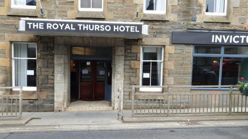 a building with a sign that reads the royal rhino hotel at Royal Thurso Hotel in Thurso
