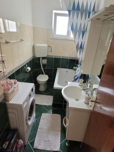 A bathroom at Apartment 3M