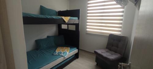 Postel nebo postele na pokoji v ubytování APARTAMENTO EN FLANDES
