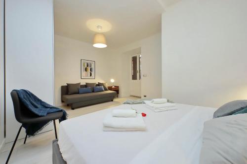 מיטה או מיטות בחדר ב-Monti Spacious Apartment 2