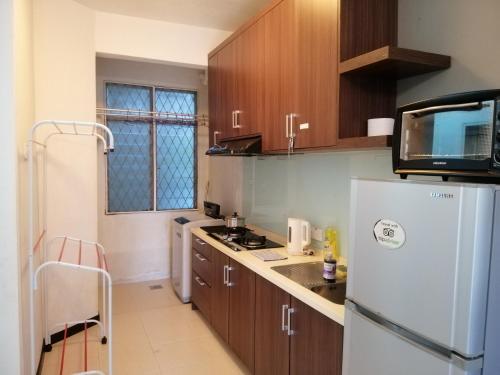 Η κουζίνα ή μικρή κουζίνα στο My Cozy Nest - Near Beach