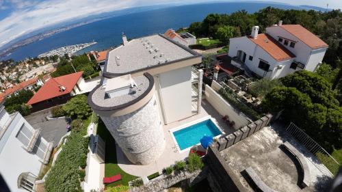 an aerial view of a house with a water tower at Villa Sunny Ičići- Apartment Sun in Ičići