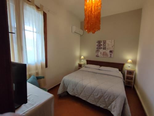 Casa degli Ulivi Etna tesisinde bir odada yatak veya yataklar
