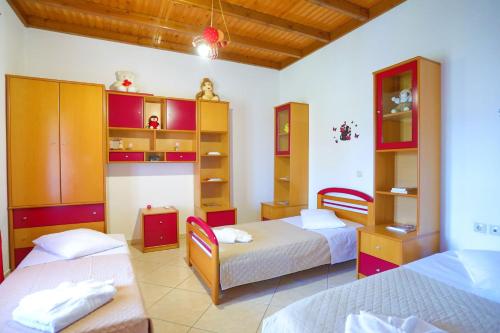 Postel nebo postele na pokoji v ubytování Villa Limoncello