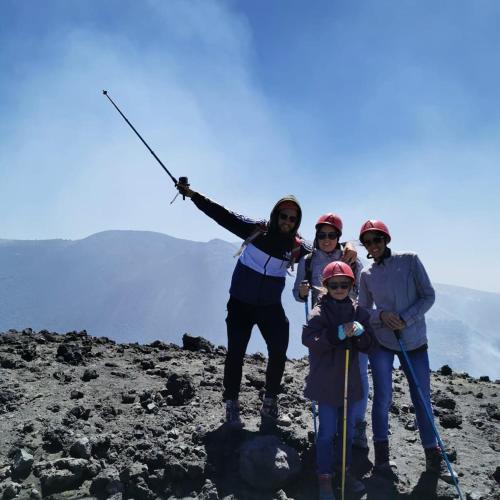 a group of people standing on top of a mountain at Casa degli Ulivi Etna in Ragalna