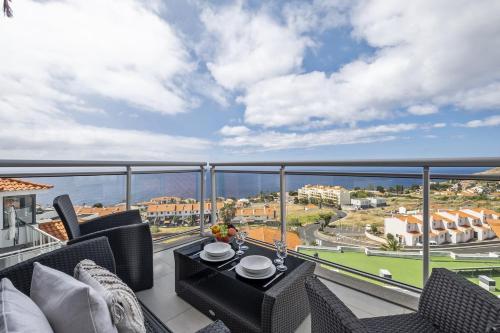 a balcony with a view of the ocean at Cote D Atlantique by Homie in Caniço