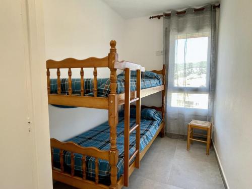 A bed or beds in a room at CAP CASTELL 8-A