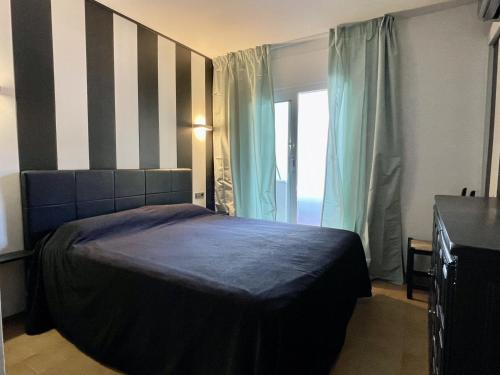Posteľ alebo postele v izbe v ubytovaní Salles Beach 6