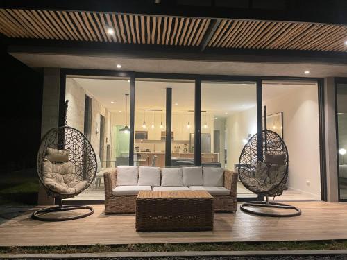 A seating area at 3BR Concrete Cove in Paracas Beach