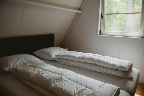 Katil atau katil-katil dalam bilik di Boshuisje Rekem - Boris