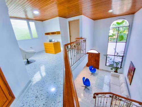 an overhead view of a living room with a couch and windows at Hotel Dann Carlton Barranquilla y Centro de Convenciones in Barranquilla